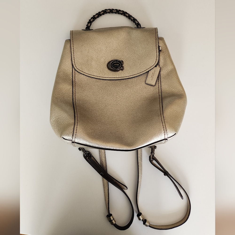 Coach metallic gold leather backpack